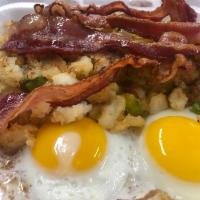 2 Eggs Any Style · Add ham, bacon, sausage, Taylor ham, Canadian bacon, corned beef hash for additional charge.
