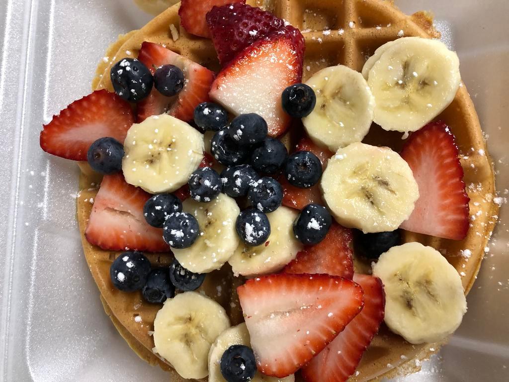 Paradise Fruit Waffle · Topped with fresh strawberries, blueberries and banana.