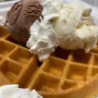 Waffle Ice Cream · Topped with 2 scoops of ice cream and whipped cream.