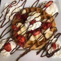 Nutella Waffle · Topped with fresh strawberries, bananas, and Nutella hazelnut spread.