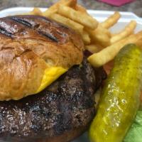 Hamburger · Char-broiled 8 oz. beef burger on a brioche bun with pickles, coleslaw, lettuce, tomatoes, a...