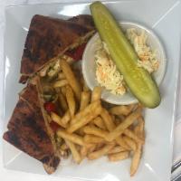 Chicken Pesto Panini · Grilled Chicken Breast with Fresh Mozzarella, Roasted Peppers, and Pesto Sauce. Served with ...