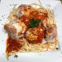 Chicken Parmigiana · Served over linguini, potato or vegetables.