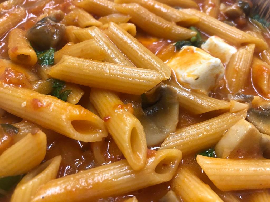 Penne Napoli · Penne pasta tossed with arrabbiata sauce, Tomatoes, Mushroom, Onion, Basil & fresh mozzarella.