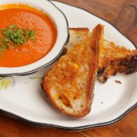 Grilled Cheese and Tomato Soup  · NY cheddar, homemade sourdough, local tomatoes 