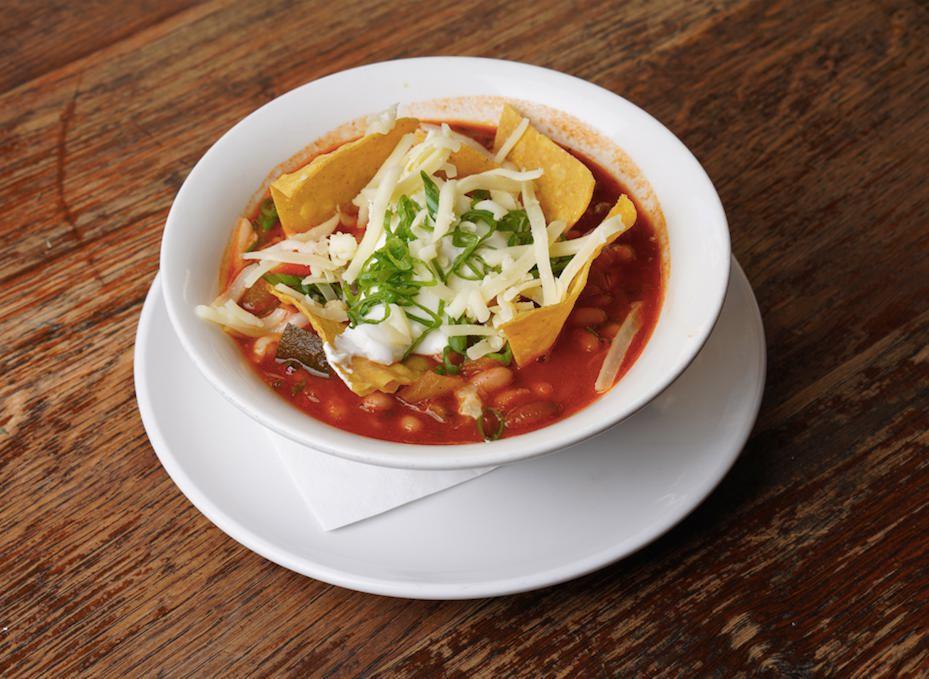 Veggie Chili · Beans, vegetables, cheddar, sour cream and tortilla chips