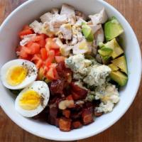 Cobb Salad · Roasted chicken, bacon, romaine, egg, avocado, tomato, and blue cheese.