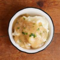Mashed Potatoes and Gravy · Kind of lumpy, really buttery mashed potatoes with chicken gravy
