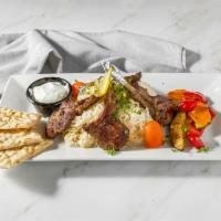 Lamb Chops · Seasoned and grilled to perfection, served with our special sauce.