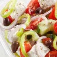 Greek Salad · Vine ripened tomatoes, red onions, green peppers, cucumbers and Kalamata olives. Tossed ligh...