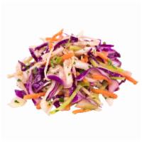 Aegean Slaw · Red and green cabbage, carrots, scallions, herbs in olive oil and lemon vinaigrette