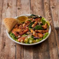 Cajun Salad · Mixed greens with blackened shrimp and chicken topped with red onion and Gorgonzola cheese i...