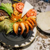 Molcajete 100% Mariscos · Octopus, crab, shrimp, and fish. Served with your choice of style.