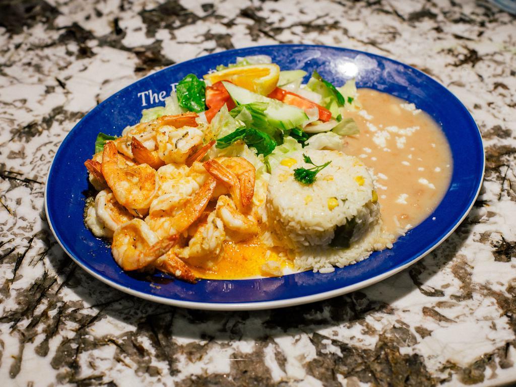 Shrimp Plate · Al patron, al mojo de ajo, diabla, rancheros. Served with shrimp, rice, beans, tortilla, and salad.