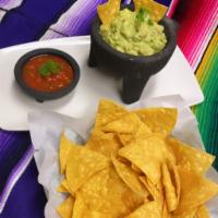 Guacamole and chips · Our homemade salsa and guac(avocado, onions, cilantro, tomatoes, jalapenos, a pinch of salt,...