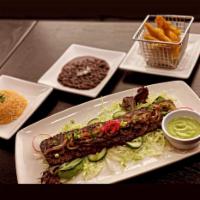 Carne Asada a la Parrilla · Grilled skirt steak served with Mix rajas, bacon mash potatoes, Melted Oaxaca cheese with ci...