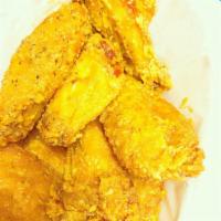 Cajun Wings · Cooked wing of a chicken coated in sauce or seasoning.