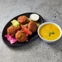 Falafel Plate · All vegetable patties made of fava beans, chickpeas, onions, parsley, 
cilantro, special spi...