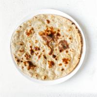 Tandoori Roti · Indian flat bread made with whole wheat flour and cooked in a tandoor