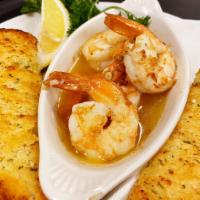 Shrimp Scampi App · Jumbo white shrimp sauteed with garlic, white wine, butter and olive oil. Served with garlic...