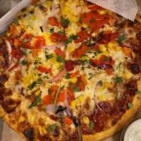 The PBQ Pizza · BBQ sauce, shredded mozzarella, chicken, corn, red onions, roasted peppers and cilantro.