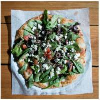 The Greek Pizza Salad · Mixed greens, cucumber, tomato, kalamata olives, with balsamic dressing, and oregano, on top...