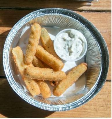 Zucchini Sticks · Fried breaded zucchini sticks with a side of house made ranch dressing.