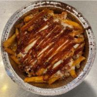 Cheese Fries · Seasoned Crisp Fries, with Bacon and Shredded Mozzarella.  Topped with BBQ sauce.