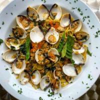 Linguine with Clam Sauce · Baby clams sauteed in garlic & oil over linguine.