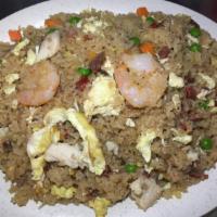 House Special Fried Rice · Chicken, pork and shrimp. Egg, peas and carrots.