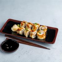 DTC Roll · Deep fried roll with spicy tuna, jalapeno, cream cheese and topped with unagi sauce, masago ...