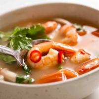 Tom Yum Soup · Shrimp with basil, bell pepper, straw mushroom kaffir lime leaf, lime juice and spicy clear ...