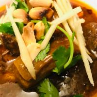 Geang Hung - Lay Northern Style · Northern spiced braised pork belly and pork loin tamarind, turmeric fresh ginger and peanuts...