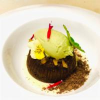 Warm Flourless Chocolate Lava Cake · 54.5% Dark callebaut, Japanese matcha ganache Center, Yuzu Compote green tea gelato and crem...