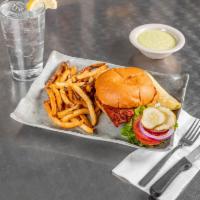 Buffalo Chicken Sandwich · Our breaded or grilled chicken tossed in your choice of sauce: hot, mild or green chile. Ser...