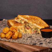 Baked Chicken Or Meatball Parmesan Grilled Cheese Sandwich · Your choice of Baked Chicken or Meatball. With Cheese Sauce, Marinara, Parmesan Cheese, Mozz...