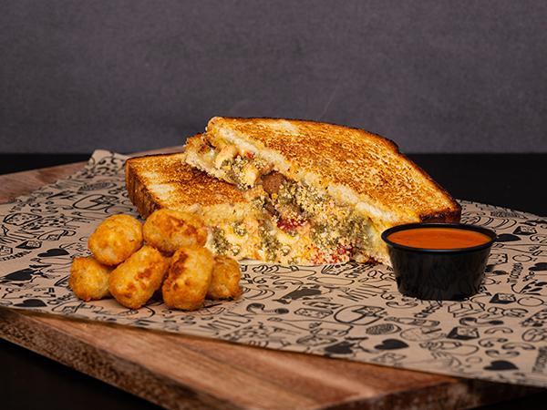 Baked Chicken Or Meatball Parmesan Grilled Cheese Sandwich · Your choice of Baked Chicken or Meatball. With Cheese Sauce, Marinara, Parmesan Cheese, Mozzarella Cheese, Pesto