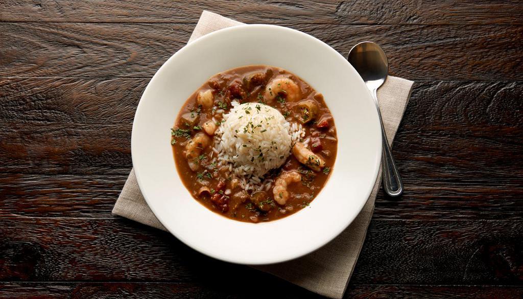 Spicy Seafood Gumbo Soup · Thick soup made from okra typically served with protein and a variety of vegetables. 