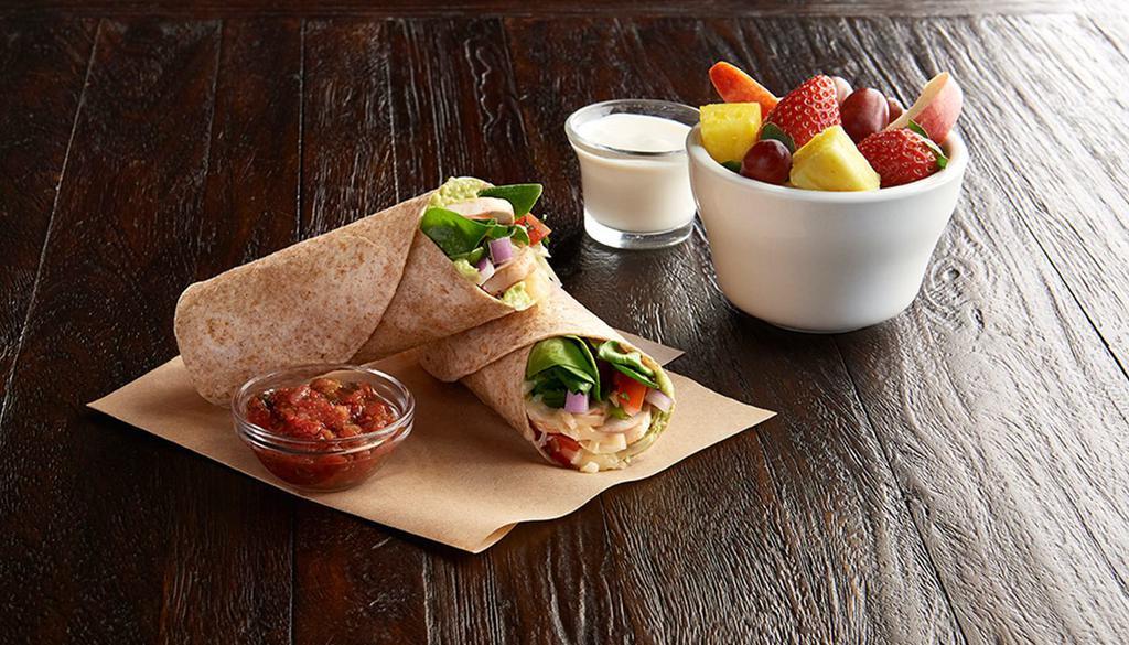 Spinach Veggie Wrap · Mushrooms, organic spinach, Asiago, guacamole, pico de gallo, toasted organic wheat wrap, side of salsa. 1  side: fresh fruit, steamed veggies, baked chips or blue corn chips. Vegetarian.