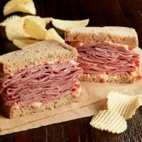Hot Corned Beef Sandwich · 1/2 lb. of hot corned beef. Your choice of bread, topped the way you like it.