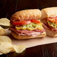 Italian Cruz Po'boy Sandwich · Nitrite-free ham, salami, Italian peppers, Asiago, shredded lettuce, Roma tomatoes, stone-gr...