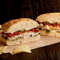 The Papa Joe Sandwich · Dedicated to our Founder's Dad. Roasted turkey breast, Asiago, roasted tomatoes, pesto aioli...