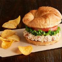 Shelley’s Deli Chick Sandwich · Our famous chicken salad with almonds and pineapple, leafy lettuce, tomato and toasted crois...