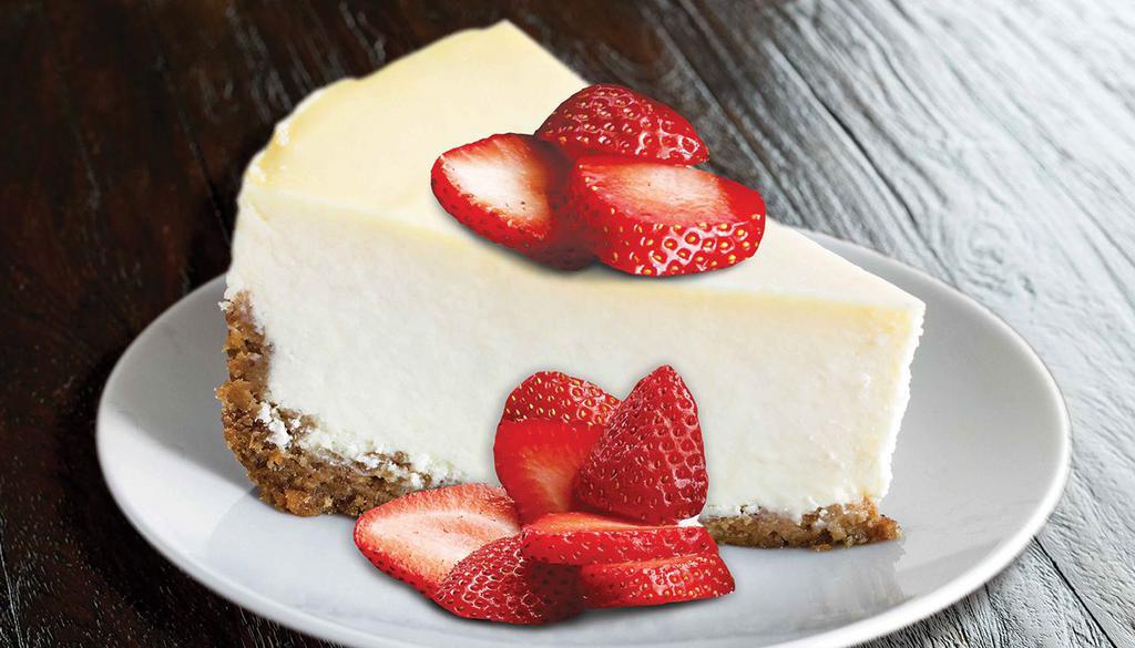 Strawberry-Topped Cheesecake · Rich creamy cake.