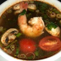 Tom Yum Soup · Choice of shrimp, chicken or veggie. Savory sour soup, mushrooms, lemongrass, lime leaves, t...