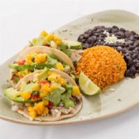 Pollo Asado Tacos · Corn tortillas with grilled chicken, avocado, mango-pineapple pico de gallo, cilantro, pobla...