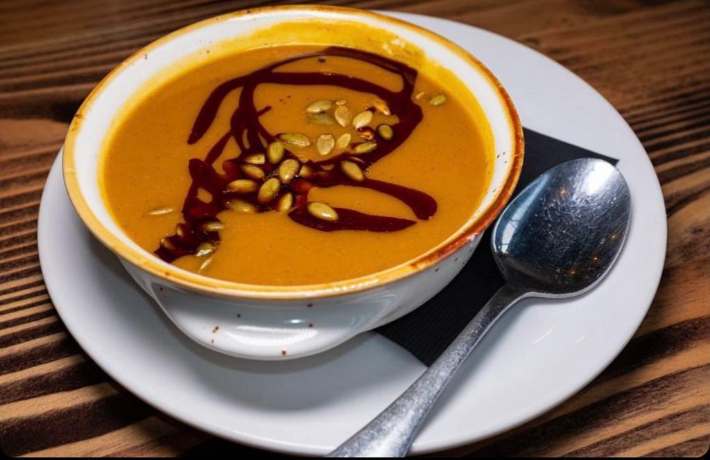 Butternut Squash Soup · Fall spices, olive oil & pumpkin seeds.