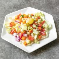 Kachumber Salad · Small cut carrots, cucumber, onion, tomatoes, pepper, chat masala and lemon.