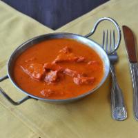 Chicken Makhani · Butter chicken. White meat chicken cooked in tomato cream sauce.