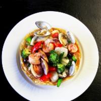 Treasure Nest · Sea scallops, little neck clams, mussels and jumbo shrimp with fresh vegetables.  Choice of ...